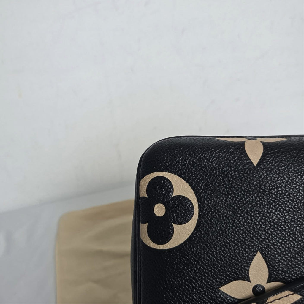 Louis Vuitton Pochette Métis Monogram Giant Empreinte Black Beige