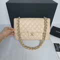 Chanel Classic Flap Jumbo Caviar – Beige