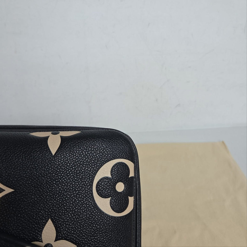 Louis Vuitton Pochette Métis Monogram Giant Empreinte Black Beige