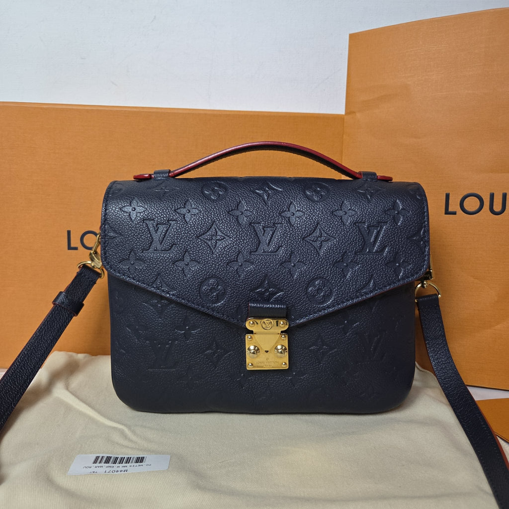 Louis Vuitton Pochette Métis bag in Marine Rouge Monogram Empreinte leather