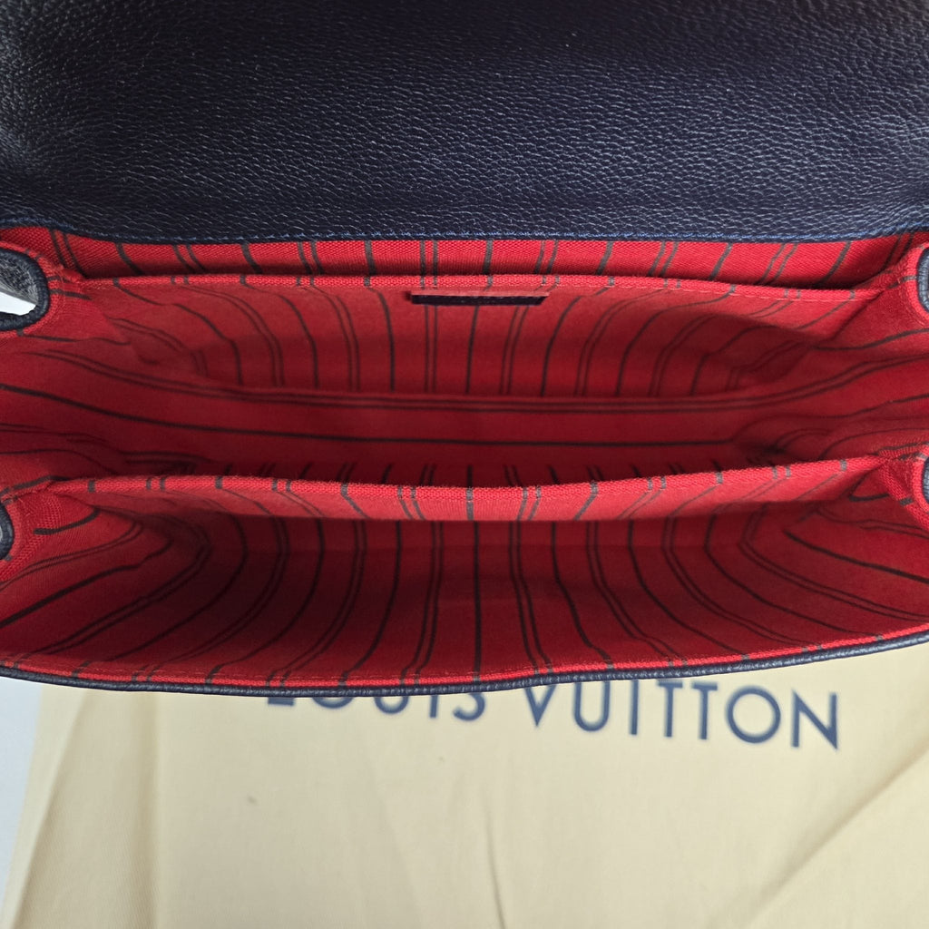 Louis Vuitton Pochette Métis bag in Marine Rouge Monogram Empreinte leather