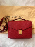 Louis Vuitton Pochette Metis in red Monogram Empreinte leather